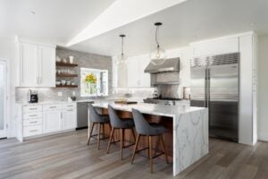 Fully Furnished White Color Kitchen Countertop with Grey Chairs in San Diego, CA